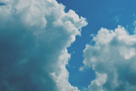 Nature background. Fluffy soft clouds in sky tonedの写真素材