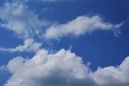 Nature background. Fluffy soft clouds in sky tonedの写真素材