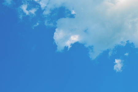 Nature background. Fluffy soft clouds in sky tonedの写真素材