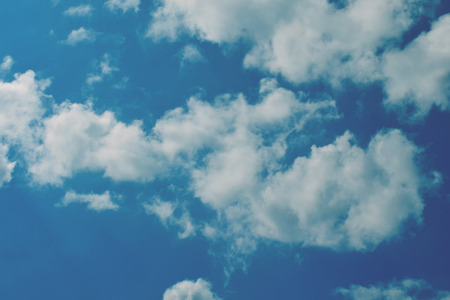 Nature background. Fluffy soft clouds in sky tonedの写真素材
