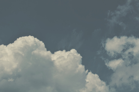 Nature background. Fluffy soft clouds in sky tonedの写真素材