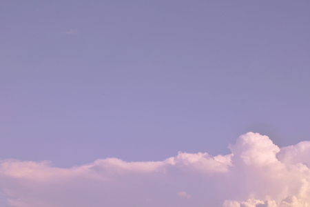 Nature background. Fluffy soft clouds in sky tonedの写真素材