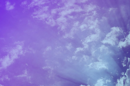 Nature background. Fluffy soft clouds in sky tonedの写真素材