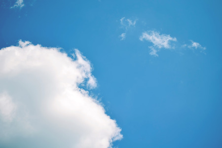 Nature background. Fluffy soft clouds in sky tonedの写真素材