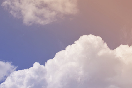 Nature background. Fluffy soft clouds in sky tonedの写真素材