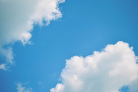 Nature background. Fluffy soft clouds in sky tonedの写真素材