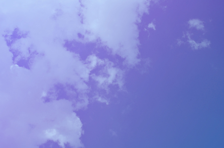 Nature background. Fluffy soft clouds in sky tonedの写真素材