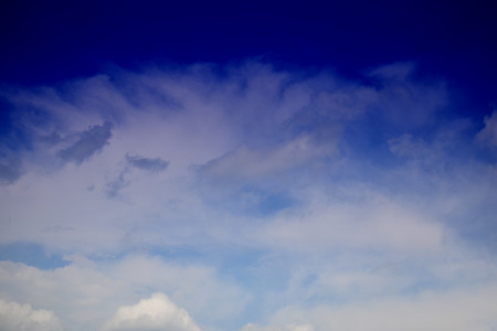 Nature background. Fluffy soft clouds in sky tonedの写真素材