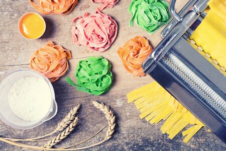 Preparation of homemade pasta on wooden backgroundの写真素材