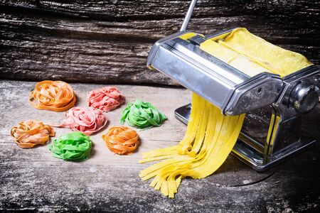 Preparation of homemade pasta on wooden backgroundの写真素材