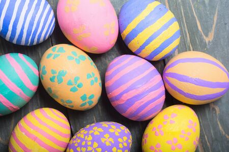 Colorful easter eggs on stone background