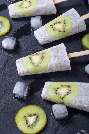 ice pop from chia yogurt and kiwi . Ice cream for kidsの写真素材