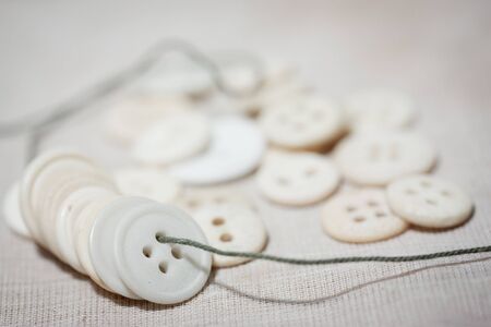 Old Buttons on a Ropeの写真素材