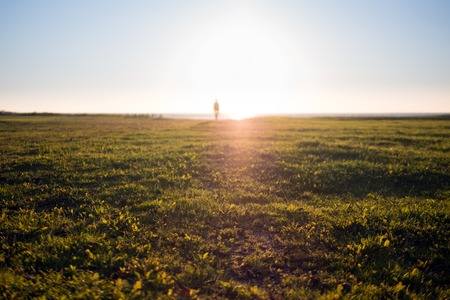 Silhouette of a Man Against the Sunlightの写真素材