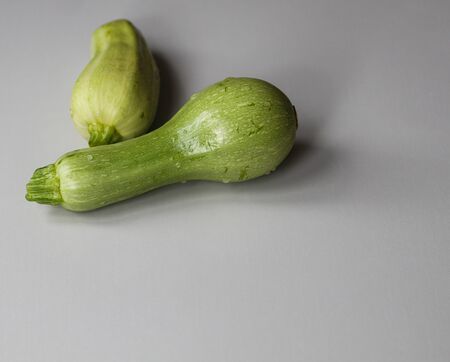 fresh zucchini on a white background close upの写真素材