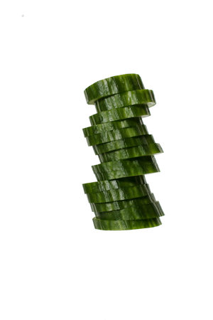 Fresh, green cucumber slice on a white background. Isolated.の写真素材