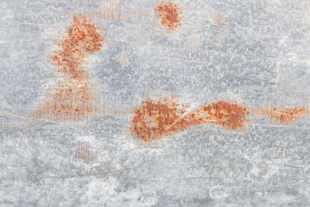 Grunge background metal plate with old paint and rust.の写真素材
