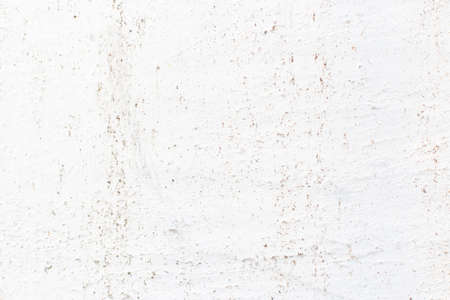 Old, rusty, painted white metal background with scratches.の写真素材