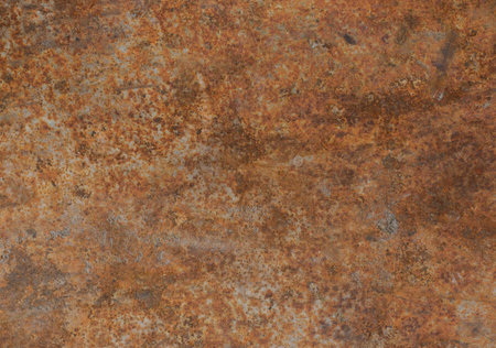 Texture of a rusty metal wall with scratches and defects. Red background. Age.の写真素材