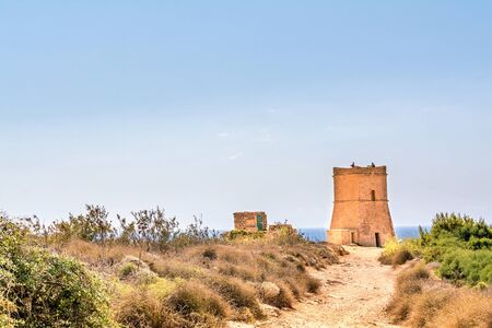 Tower on the Golden Bay beach in Maltaの写真素材