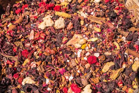 fragrant tea from dried leaves of roses, rose hips, cinnamonの写真素材