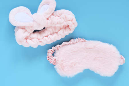 tools for daily care. Reusable Discs, Cream Jar, Bamboo Toothbrush, Fluffy Sleep Mask, Roller Quartz Facial Massager and Guasha Scraper for Facial Massage. Flatlay with tools for facial skin careの写真素材