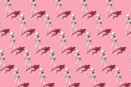 pattern from human skeleton strides like a zombie with outstretched arms. Trending image on a pink...