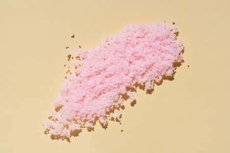 Scented pink bath salt or body scrub. Natural skin care product. Hygienic routine.の写真素材