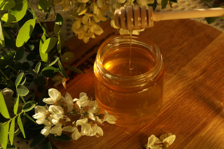 jar of honey with flowers