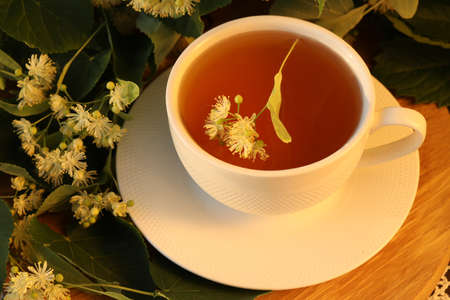 cup of herbal tea with linden blossom