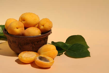 fresh apricots on pink background with copy spaceの写真素材