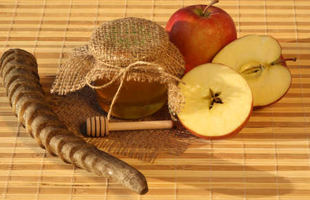 Rosh Hashanah holiday. Celebrating attributes - apples, honeyの写真素材
