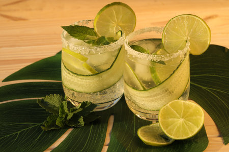 glasses with fresh cold lemonade with mint and limeの写真素材