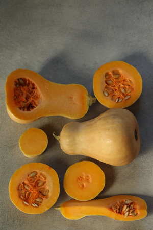 Butternut squash on gray background, top view. healthy foodの写真素材