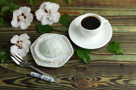 Colorful japanese sweets daifuku or mochi. Sweets close up on the plate with cup of coffeeの写真素材