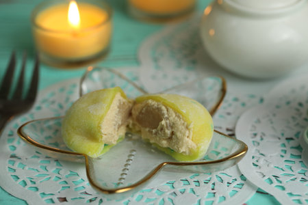 Colorful japanese sweets daifuku or mochi sliced. Sweets close up on the plateの写真素材
