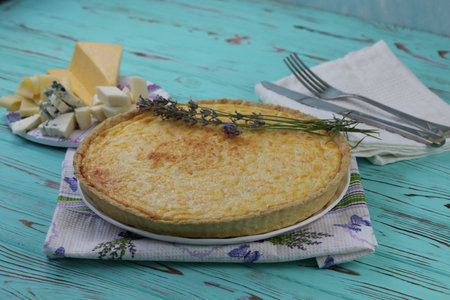 Delicious Quiche pie with four cheese fillingの写真素材