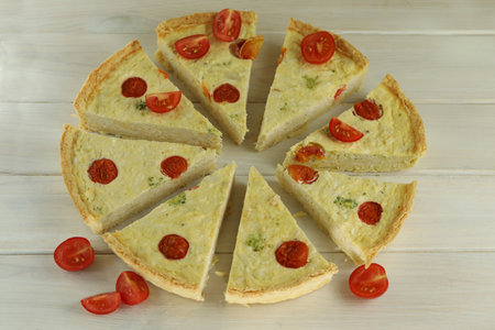 Delicious Quiche pie with chicken and tomatoes fillingの写真素材