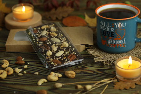 Homemade chocolate with cup of coffee and nuts