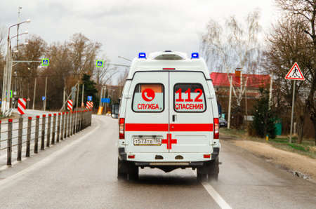 Moscow, Russia - April 19, 2020: coronavirus global pandemic, russian ambulance car in motion on the...
