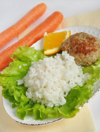Home cooking, cutlet with rice and vegetablesの写真素材