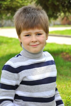 Portrait of a boy in the parkの写真素材