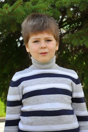 Portrait of a boy in the parkの写真素材
