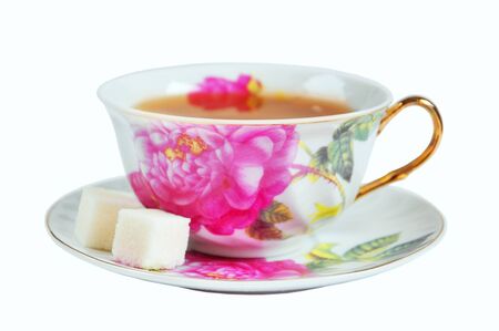 A cup of tea and sugar in isolation on a white backgroundの写真素材