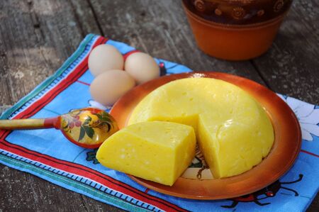 Homemade cheese on a plateの写真素材