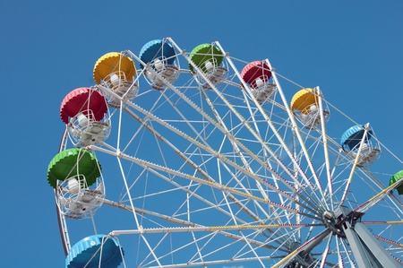 Ferris Wheel on a background of blue skyの写真素材