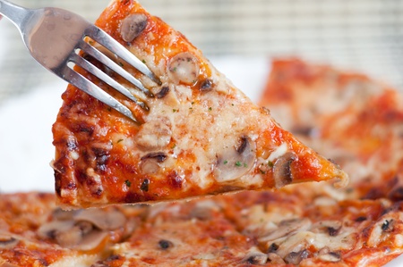 Delicious Italian pizza with mushroomsの写真素材