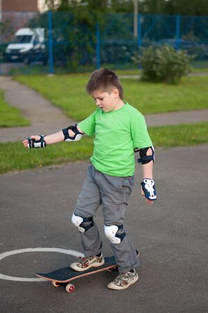 A boy riding a skateboardの写真素材