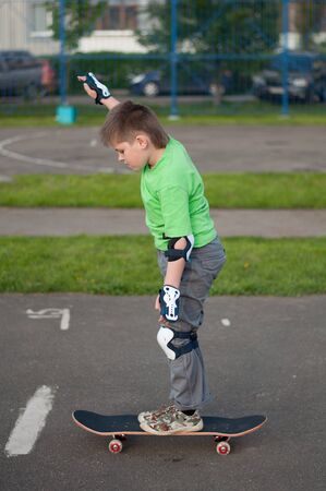 A boy riding a skateboardの写真素材