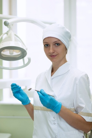 Portrait of a woman dentist in the clinicの写真素材